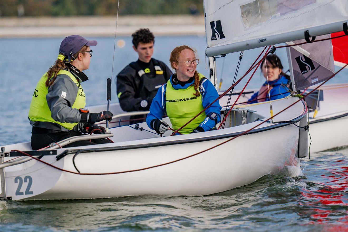 Close up of young people involved in Eric Twiname racing