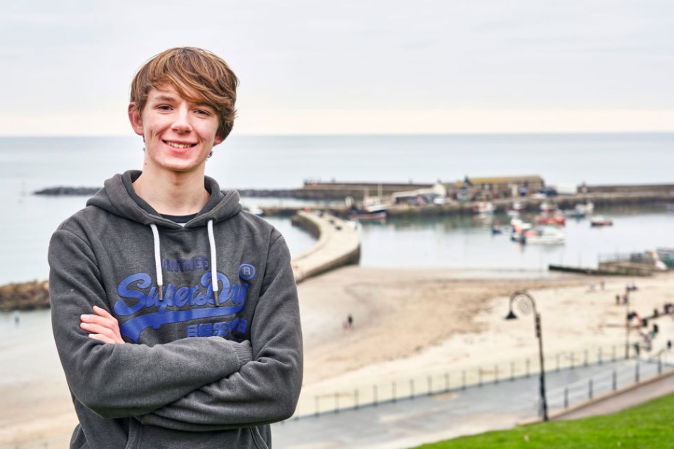 An image of Harry Besley by the sea
