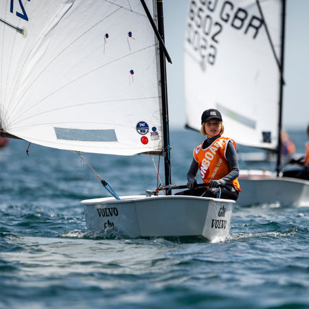 Multiple dinghies navigating the water