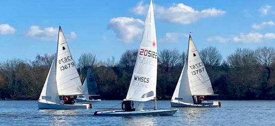 Long shot of Welsh Harp Sailing Club's boats on water