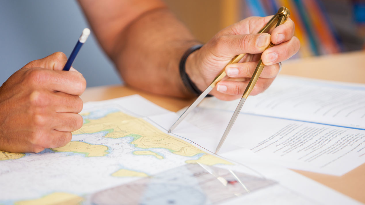 Yachtmaster Ocean Theory Chartwork, Holding Compass Over Map
