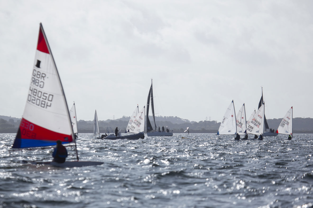 windsurfers gliding through the water