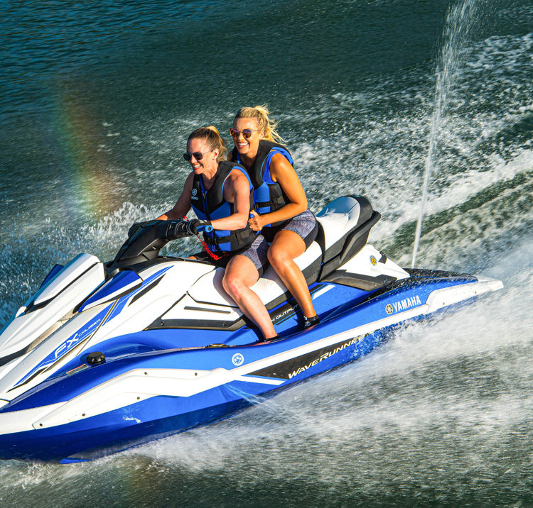 Young women enjoying an afternoon on their PWC (jet ski)