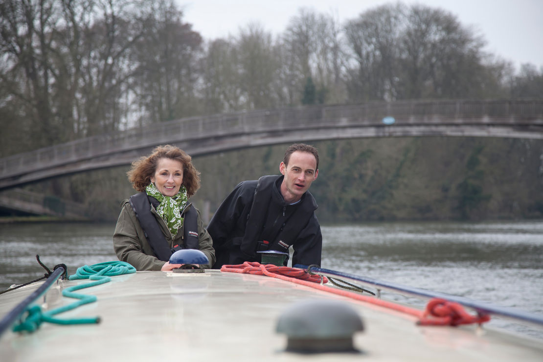 couple enjoying a winters day on their canal boat