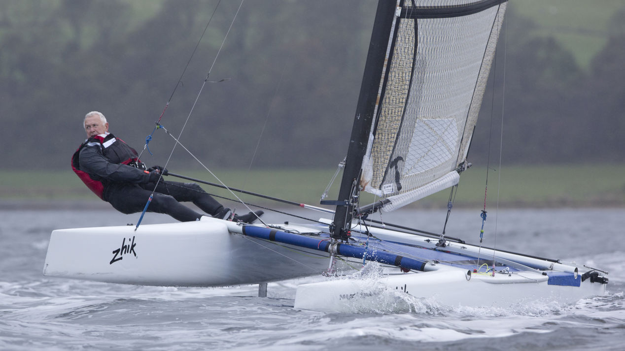 Man on Multihull on winters day