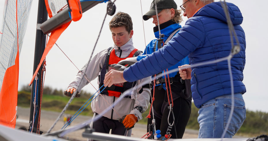 Sailors learning about ropework