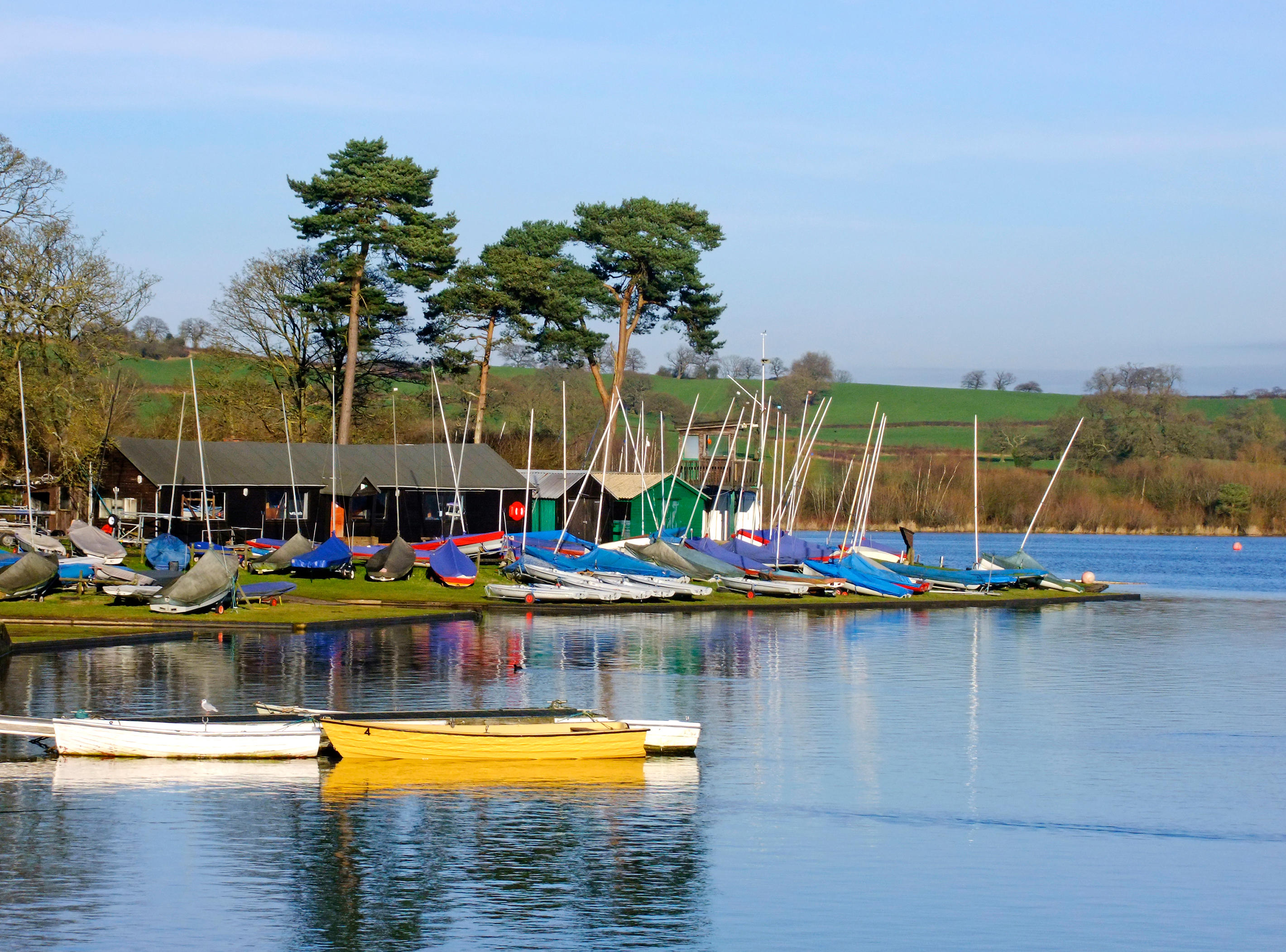 Boats anchored and moored outside sailing club