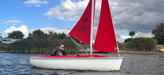 Snettisham Beach Sailability sailor takes to the water in a Hansa 303