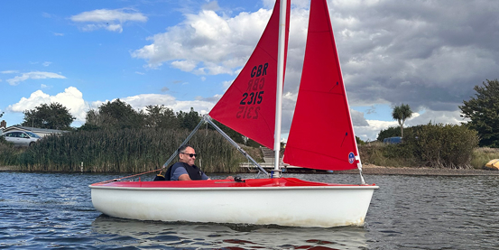 Snettisham Beach Sailability sailor takes to the water in a Hansa 303