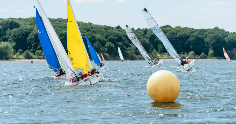 Dinghies travelling through the water