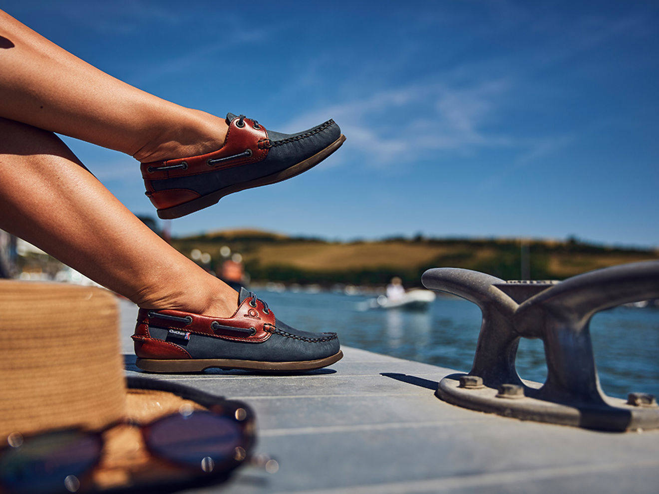 close up of nav and red pair of sebagos