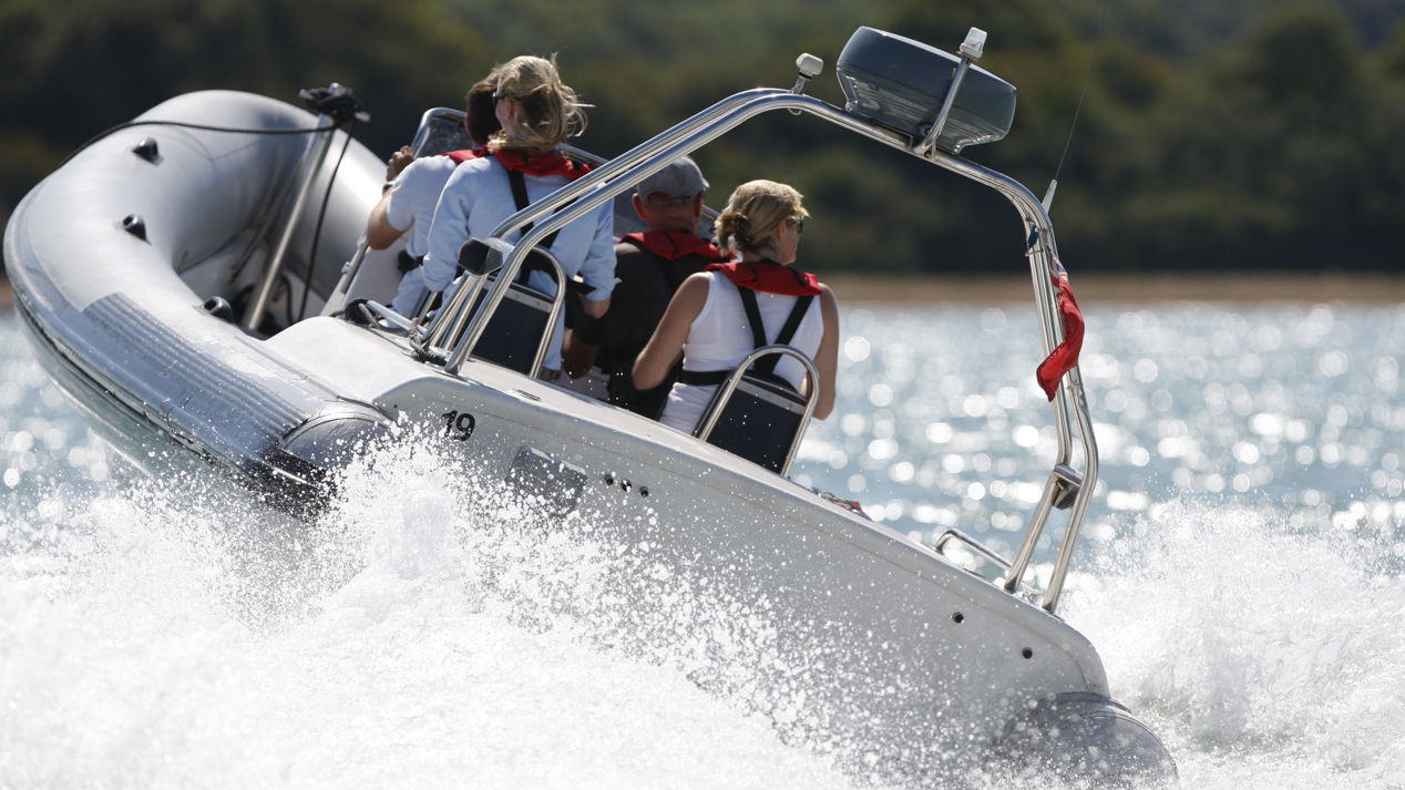 Powerboat bow lifted upwards with speed 