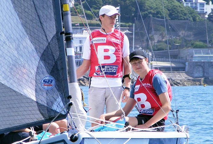 keelboat users smiling at the camera