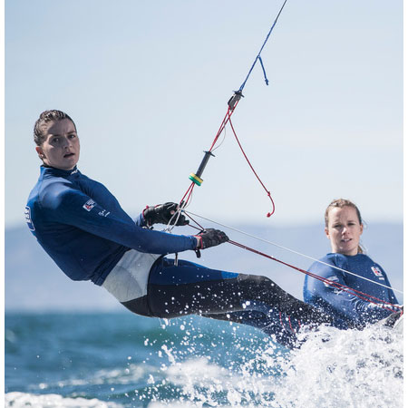 Two women sailing on the open water