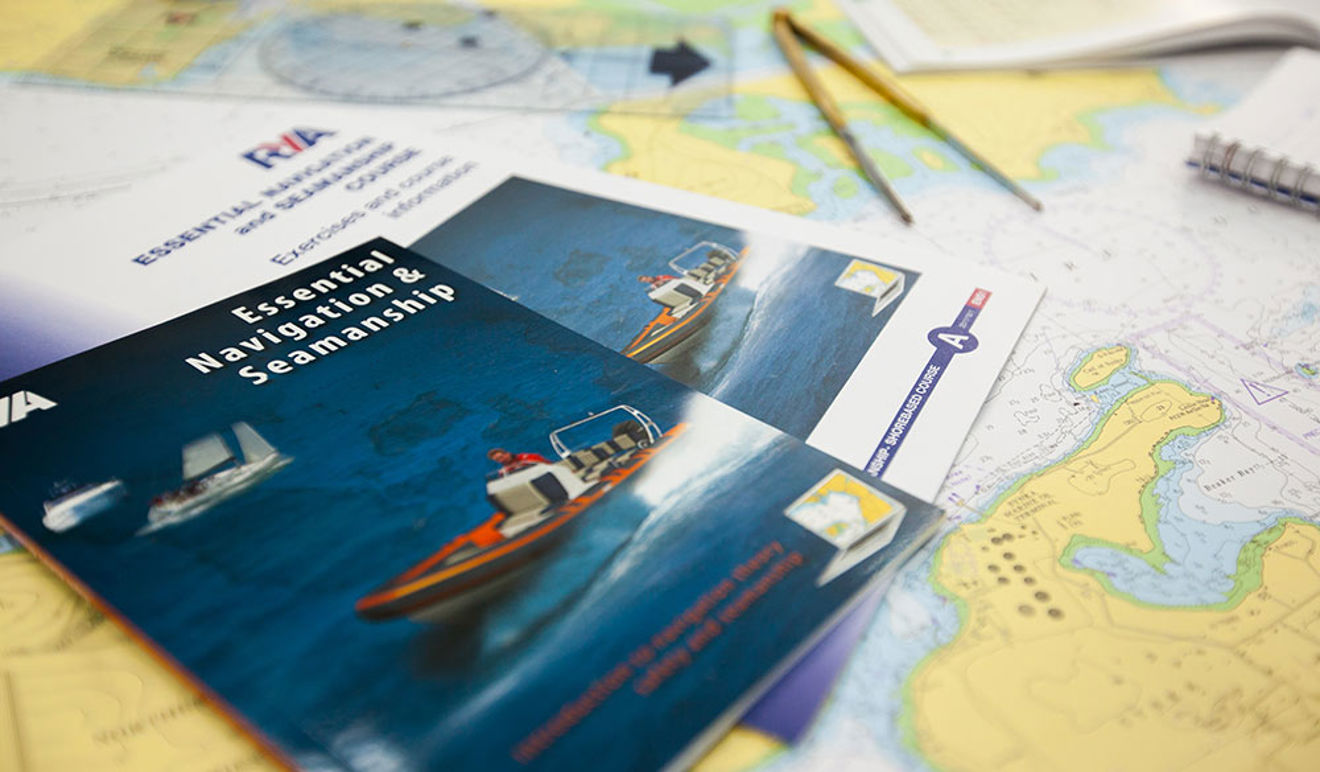 Navigation course books on a table