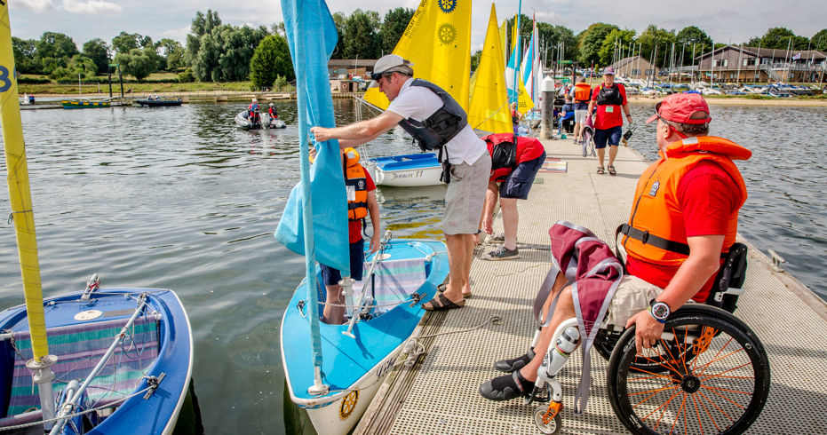 sailability sailing session, sailor in wheelchair approaching boat