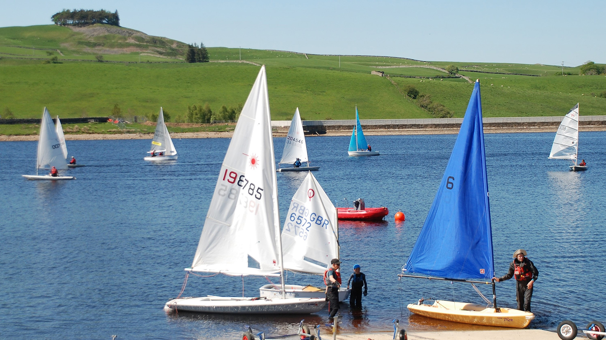 Sailors launching their dinghies at Teesdale