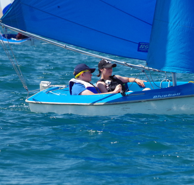 Joe sailing in a dinghy on the ocean