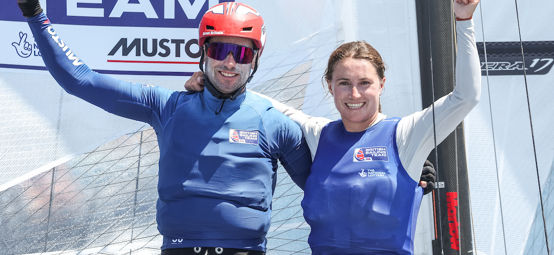 An image of John Gimson and Anna Burnet cheering in boat at Marseille test event