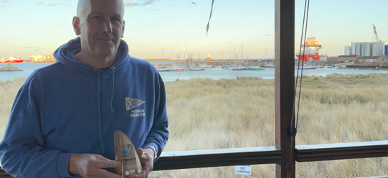Martin Thain of Peterhead Sailing Club recieving RYA Scotland Impact Award