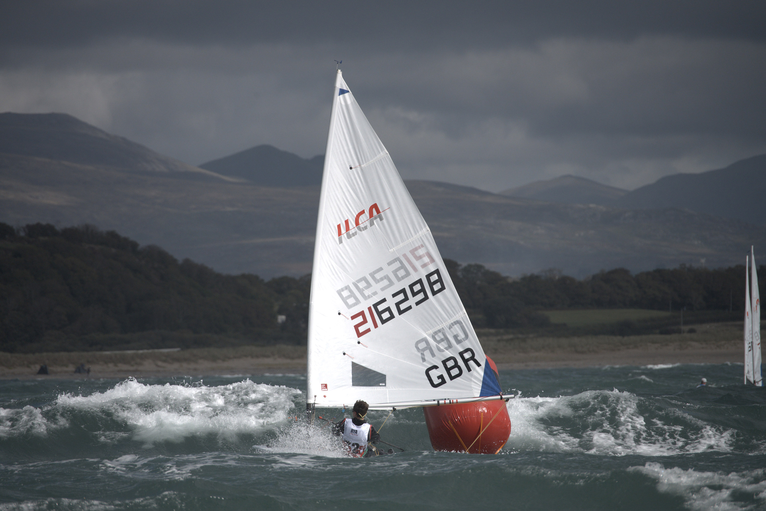 ILCA sailing in windy conditions at the Welsh Youth & Junior Championships 2025