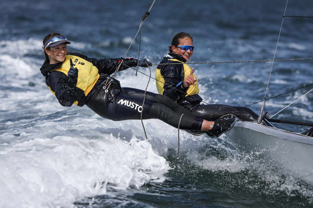 An image of two females on a fleet of 29er for the RYA Youth National Championships