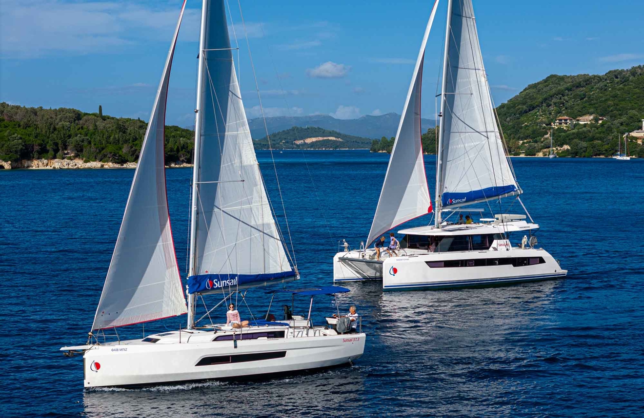 Two yacht charters sailing next to each other