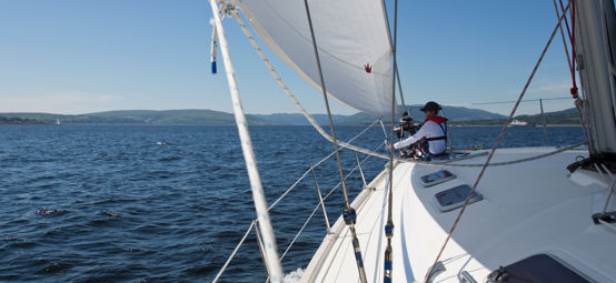 POV shot of sailboat on water looking out