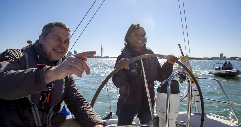 Instructor and trainee enjoying their yachtmaster fast track course