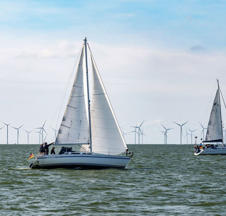 Sailing Yachts Navigating Wind Farm 1000X584