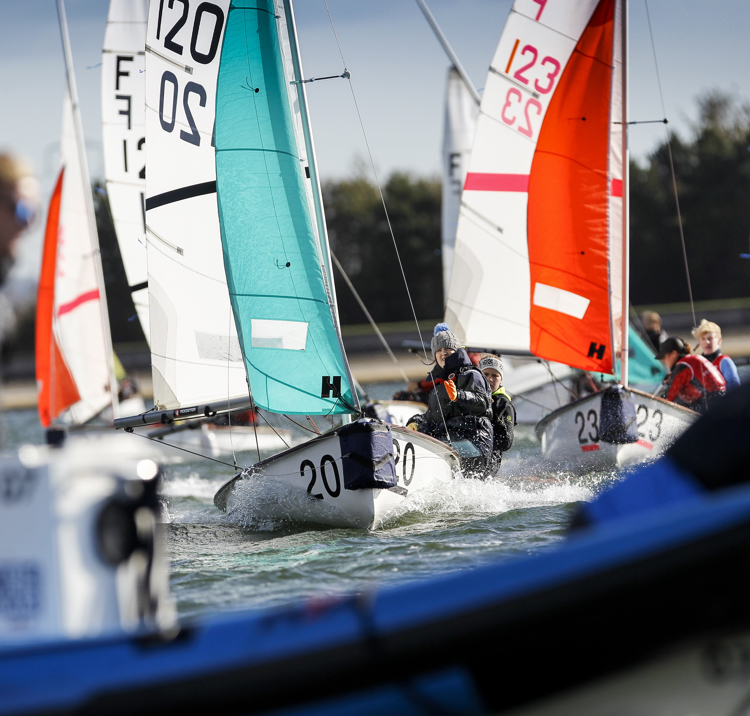 Dinghies racing in calm waters