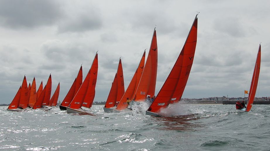 A group of boats part of the Squib national class