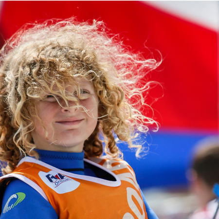 child smiling at the camera