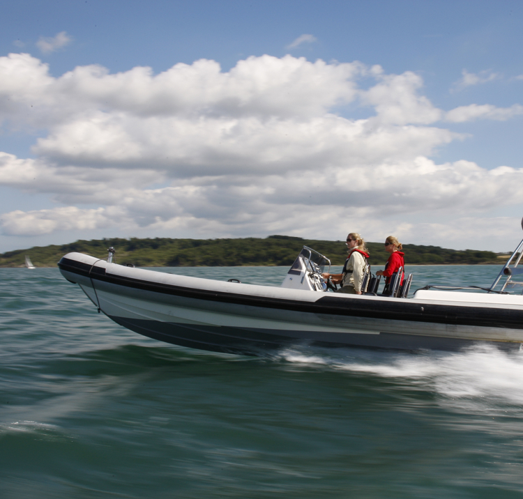 Powerboat travelling speedily through the water