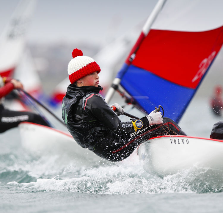 children on a topper wearing winter hats
