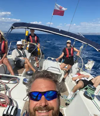A group of people enjoying a day of sailing a yacht with Yacht Sail Training School, Brac Island, Croatia on a lovely sunny day
