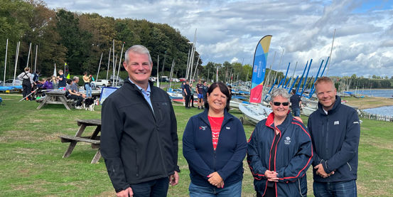 Junior Club Championships - image of VIPs by the water side