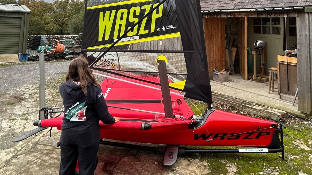 RYA CW Pathway & Events Officer Hatty Morsley rigging one of the two new Welsh Sailing Waszps