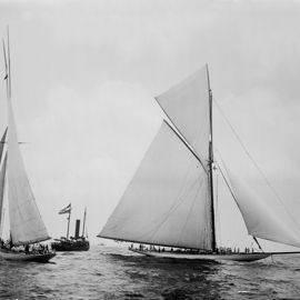 Black and white old image of traditional sailing yachts