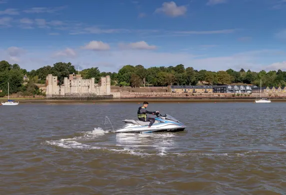 A person on a jet ski on the water training with Guardian Marine Training Services, Chatham