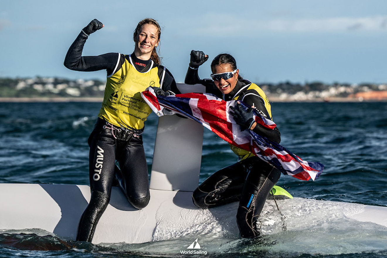 Amelie Hiscocks and Lila Edwards celebrate after winning gold in the 29er class.