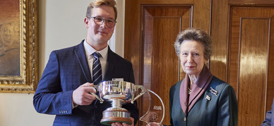 An image of Freddie Jablonski presented award by HRH the princess Royal