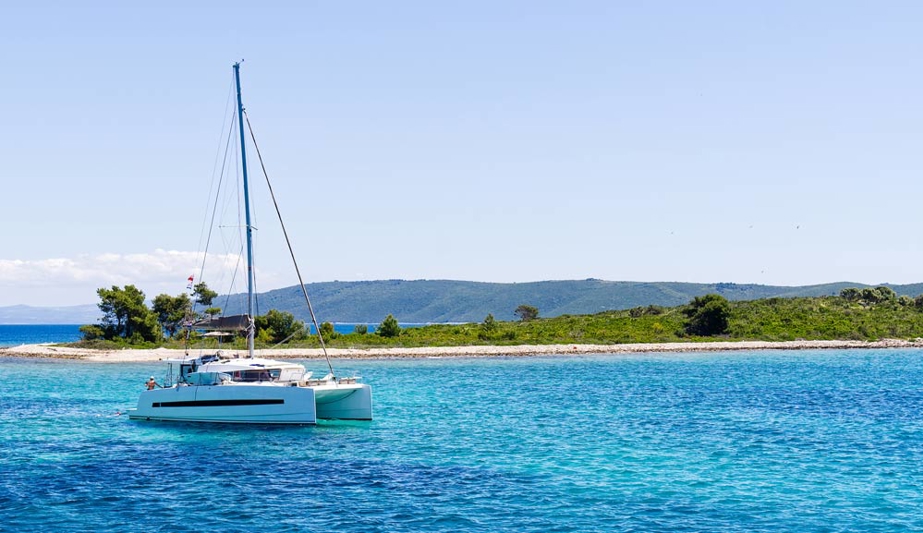 boat sailing in crystal blue waters