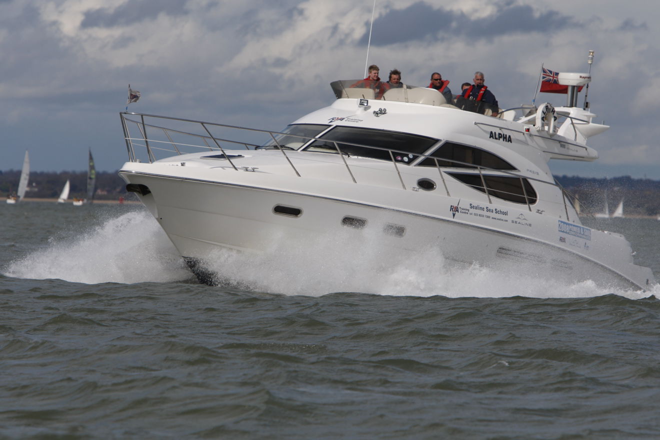 Motor boat travelling across water