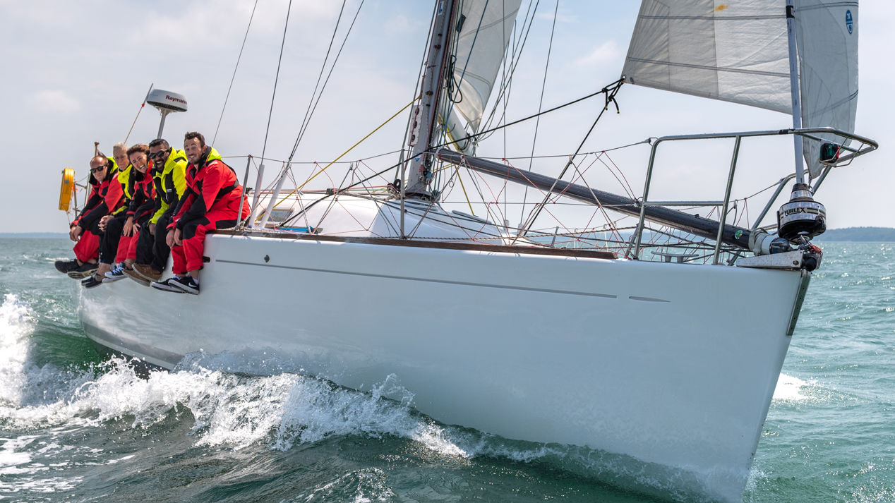  Competent Crew And Day Skipper Course Crew Sat On Boat Edge