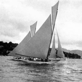 Black and white wooden sailing boat