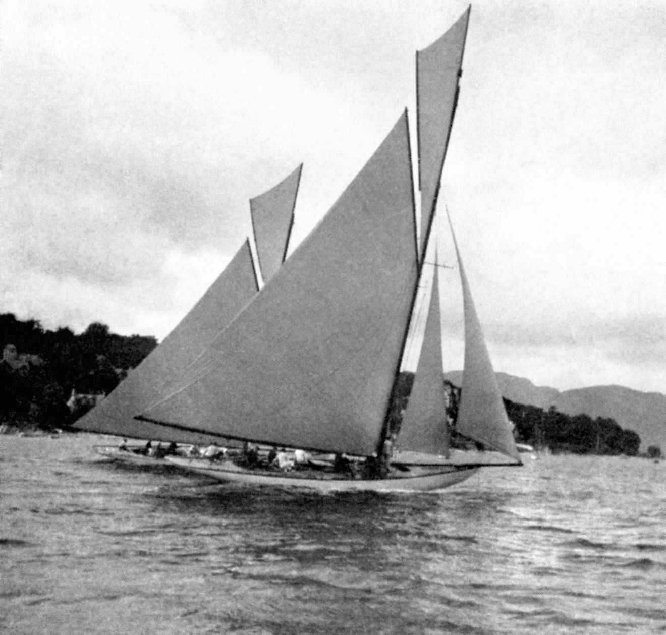 Black and white wooden sailing boat