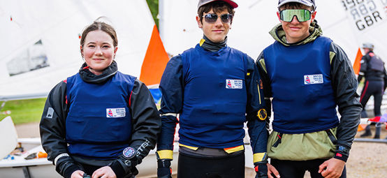 Young sailors wearing their Pathway Club race bibs