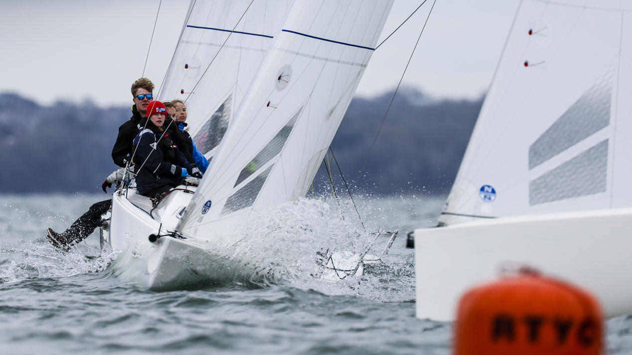 Young racers navigating a course in winter