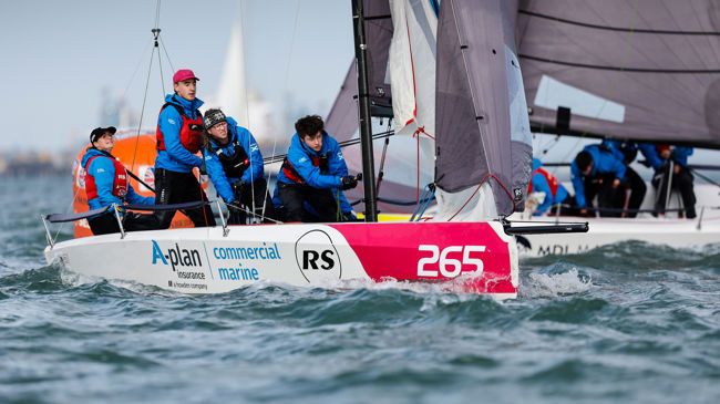 Long shot of crew onboard a keelboat